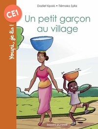 UN PETIT GARCON AU VILLAGE