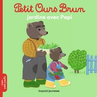 PETIT OURS BRUN JARDINE AVEC PAPI