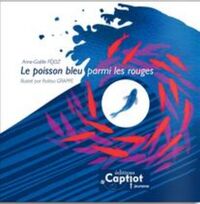 Le poisson bleu parmi les rouges