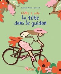 CLAIRE A VELO. LA TETE DANS LE GUIDON