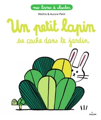 UN PETIT LAPIN SE CACHE DANS LE JARDIN