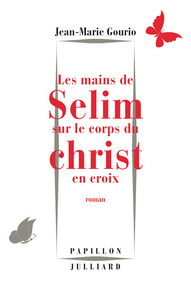 Les mains de Sélim sur le corps du Christ en croix