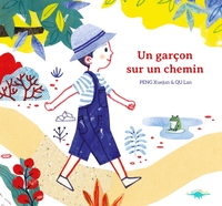 Image de Un garçon sur un chemin
