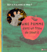 Image de Une pomme dans un trou de souris