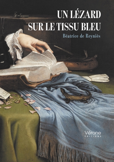 Image de Un lézard sur le tissu bleu
