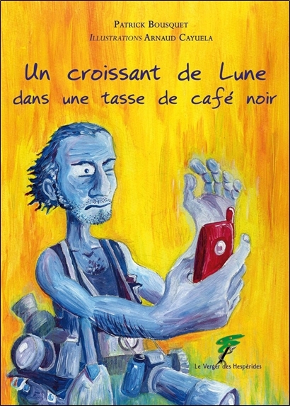 UN CROISSANT DE LUNE DANS UN BOL DE CAFE NOIR