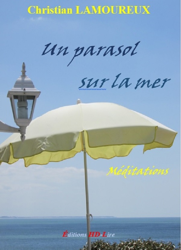 Un parasol sur la mer