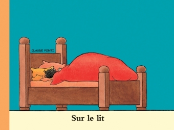 sur le lit