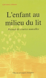 L'enfant au milieu du lit